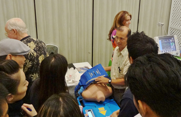 Hawaii State Respiratory Conference, September 2013. Eric Tessmer demonstrating the AutoPulse.    Lifescience Resources photo by John McMahon.