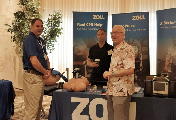 Trauma Symposium, July 2015.  Jay Bower and Mike Borkowski of Zoll Medical Corporation and Ben Gantz of Lifescience Resources at Zoll’s booth.  Lifescience Resources photo by Eric Tessmer.